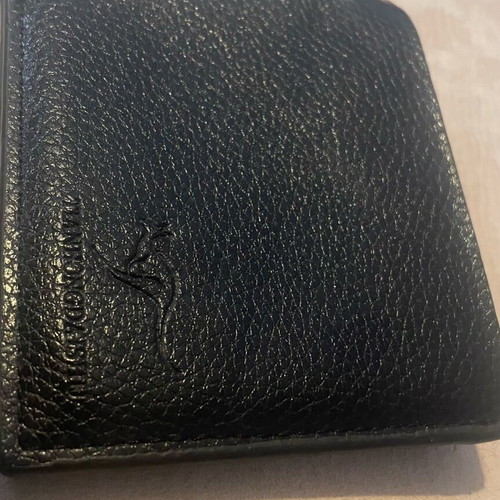 Leather wallet used with many compartments and slim design