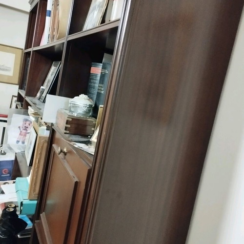 Mahogany bookcase and desk like new with drawers and cabinets