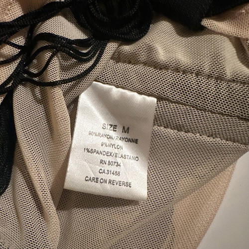 Mini skirt with fringes and sheer details like new, size S