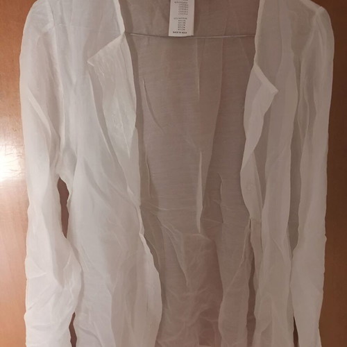 Semi-transparent white shirt size M like new, no collar, buttons