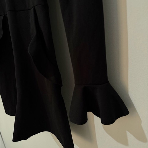Zara one-piece shortsuit used, black with ruffles and open back