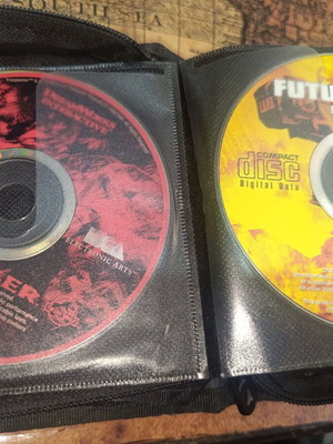 Case with various PC games and demos used