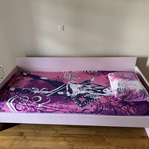 Children's wooden single bed-sofa in pink shade, used