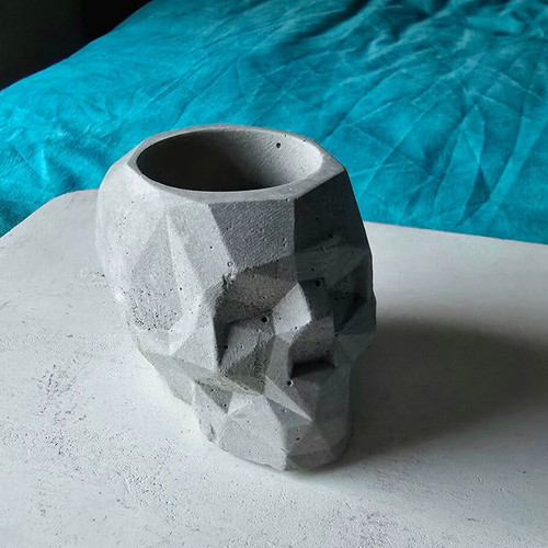 Handmade concrete skull decoration, gothic style