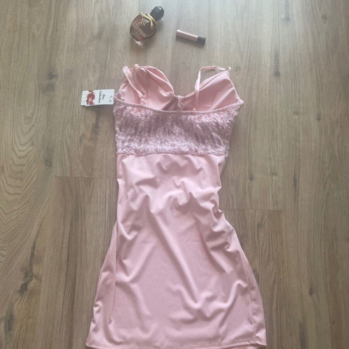 Elegant women's dress, pink, padded bust, cocktail style
