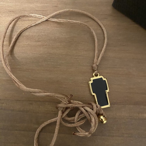 Gold-plated cross new, silver with black cord