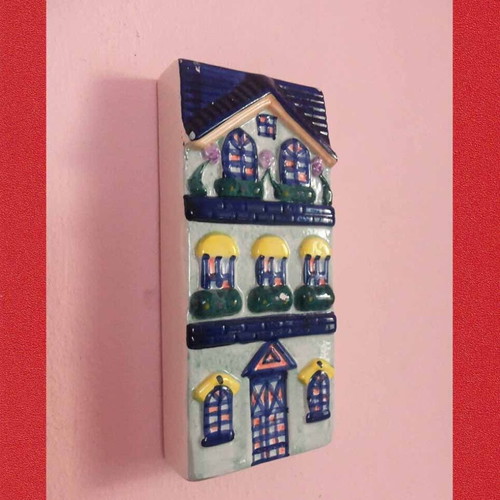 Ceramic wall decor used, unknown potter flower vase