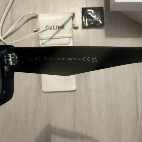 Celine sunglasses used with minor scratches, black