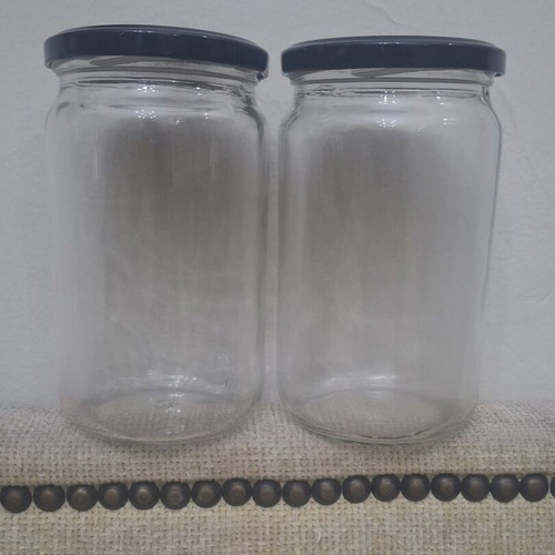 Set of 10 transparent glass storage jars with black metal lids