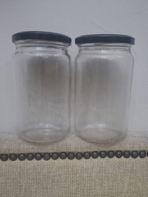 Set of 10 transparent glass storage jars with black metal lids