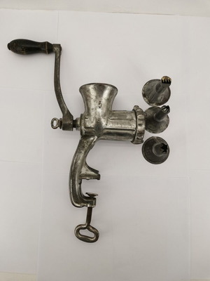Meat grinder used with 3 vintage cookie attachments from 1950