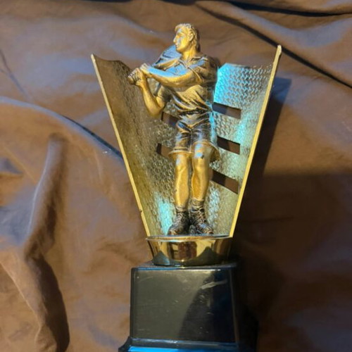Award trophy used with tennis player figure for padel tournaments