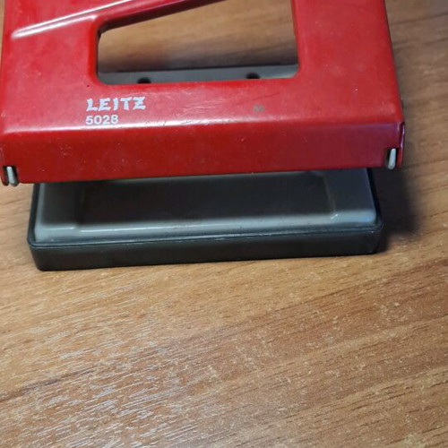 Perforator used for making holes in paper