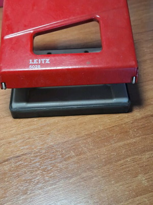 Perforator used for making holes in paper