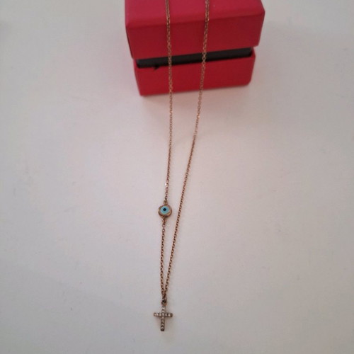 Loisir cross necklace like new, gold plated with evil eye