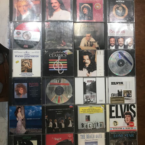 CDs of foreign music like new, 163 singles, doubles & triples