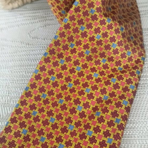 Frederick Theak silk tie like new, multicolored orange