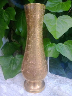 Bronze vase used with intricate hand carvings