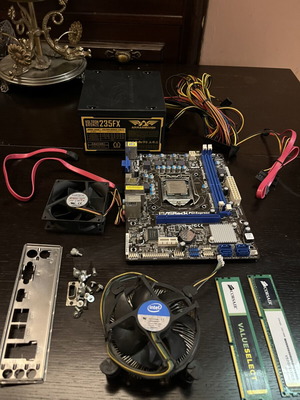 ASRock H61M-HVS motherboard with Intel Core i3-3220, Corsair DDR3 RAM, Armaggeddon 470W PSU