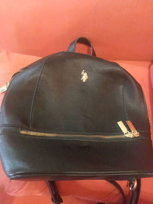 Backpack bag used with black eco leather