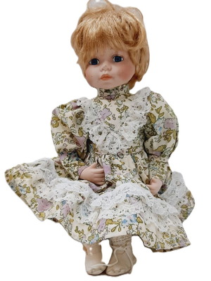 Vinyl doll 33 cm with elastic joints, blonde hair, dress and shoes, like new