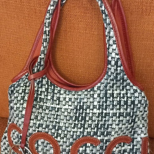 Coccinelle knitted shoulder bag like new with leather details