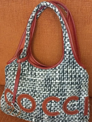 Coccinelle knitted shoulder bag like new with leather details