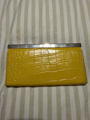Clutch wallet like new, yellow, bought from NY
