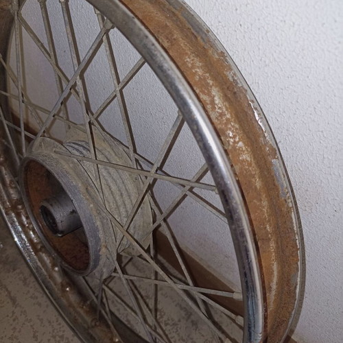 Motorcycle rim used, old with surface rust and missing spoke