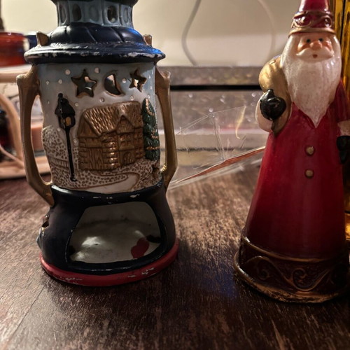 Santa Claus candles and ceramic lantern lightly used