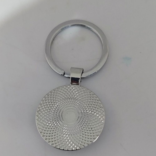 Metal keychain like new with green radar screen design
