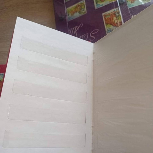 Stamp album new, 8 leaves, 16 pages
