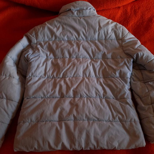 Bomber jacket light blue like new, with down filling