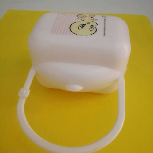 Plastic pacifier case used with Tweety design