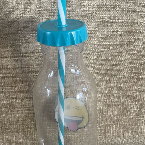Plastic Transparent Bottle with Straw and Emoji Face Used