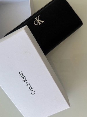 Calvin Klein wallet new, black, with metal logo and box