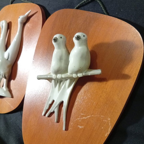 Wall panels used with wooden base and porcelain swallows and storks