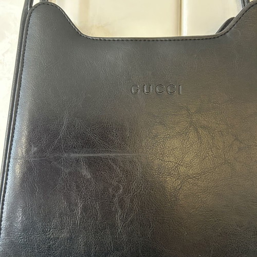 Black shoulder bag used with surface scratch