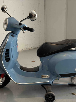 Electric kids Vespa ride-on toy