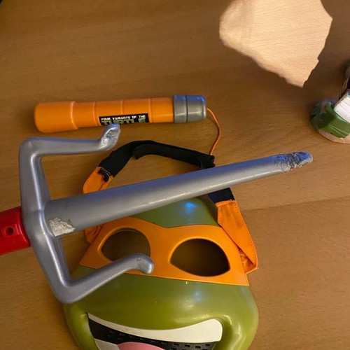 Ninja Turtle mask and weapons used