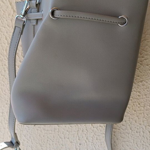 Gray medium-sized bucket crossbody bag like new, synthetic leather