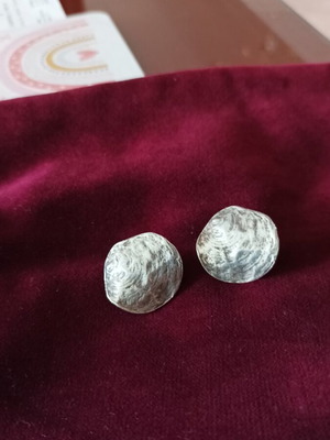 Earrings like new with embossed texture