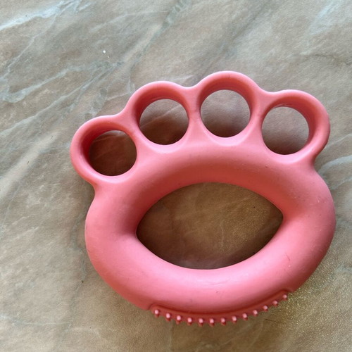 Grip strength trainer like new with 4 finger holes