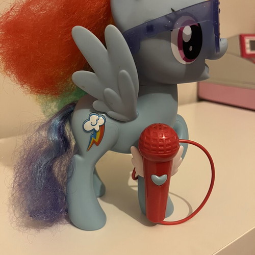 My Little Pony Singing Rainbow Dash figure used with microphone and music