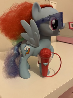 My Little Pony Singing Rainbow Dash figure used with microphone and music