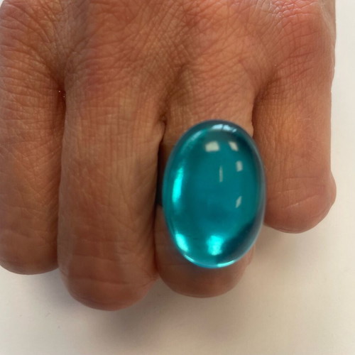 Statement ring with adjustable oval blue stone used