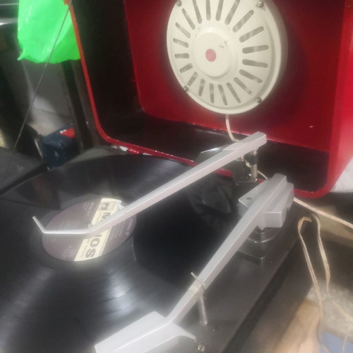 Red Garrard collectible pick up used with built-in speaker