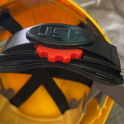 Work helmet used with head adjuster