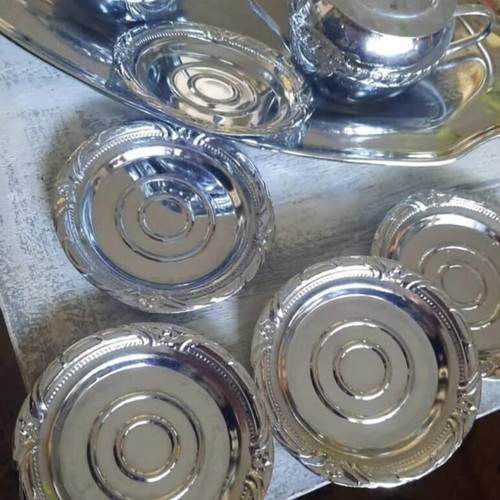 Stainless steel set with creamer, sugar bowl, coasters and tray like new