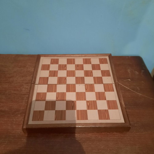 Chess board used, missing the king